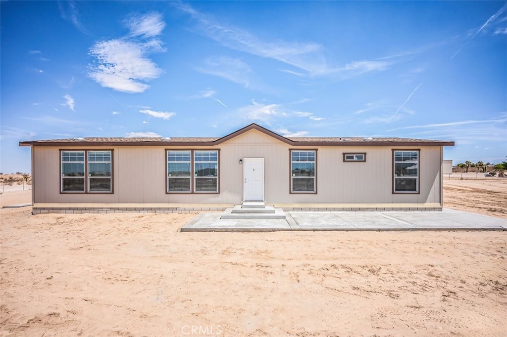 Welcome to 12873 Mountain Rd in Pinon Hills. This 4-bedroom, 2-bathroom home is situated on 2.01 acres of fully fenced land, offering privacy, open space, and panoramic mountain views. With 1,780 sq. ft. of living space, the home features an open-concept layout with a modern kitchen that includes stainless steel appliances, ample counter space, and sleek cabinetry. The living and dining areas flow seamlessly, creating a comfortable setting for everyday living or entertaining. Each bedroom provides a relaxing retreat, while the bathrooms showcase updated finishes and contemporary design. Outdoors, enjoy the wide-open desert landscape, tranquil mornings, and star-filled evenings. This property combines comfort, style, and serene surroundings—an ideal opportunity to own a beautiful home in Pinon Hills.