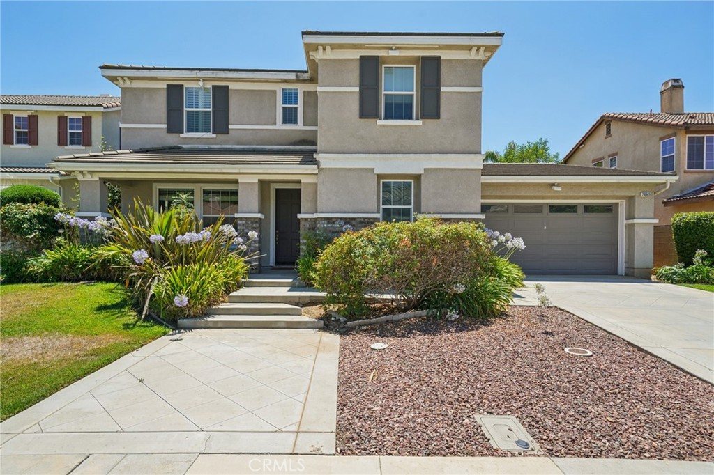 TRULY A MUST-SEE! Stunning former Beazer model home featuring 3,351 sq. ft., 4 bedrooms, 4 bathrooms, and a private office, situated on a pool-sized lot with a 3-car tandem garage. This home has designer upgrades, including custom paint, elegant window treatments, and upgraded flooring. Step inside to find beautiful wood flooring, custom-designed tile, and crown molding in the dining and living rooms. Designer area rugs are included with the home. The spacious great room with a cozy fireplace flows seamlessly into the gourmet kitchen, complete with granite slab countertops, custom tile backsplash, a large center island with seating, GE stainless steel appliances, a writing desk, and a walk-in pantry. The downstairs library features crown molding, custom-built-in desks, bookshelves, designer carpeting, and plantation shutters. The laundry room, also downstairs, offers ample cabinetry, Corian countertops, and a sink. Upstairs, all bedrooms have their unique designer touches, including custom carpeting and stylish finishes. Each bathroom features tile flooring and Corian countertops. The luxurious primary suite boasts crown molding, ceiling fans, custom wallpaper, a private deck, dual sinks, upgraded countertops, wood shutters, and a large walk-in closet. The backyard is perfect for entertaining with a concrete patio, covered seating area, and built-in BBQ—ideal for summer gatherings! Located in a fast-growing city, this home is your chance to own a beautifully upgraded property in a prime area. Don’t miss the opportunity to make this your forever home!
(See MLS #T09091575 for model home photos when the property was vacant.)