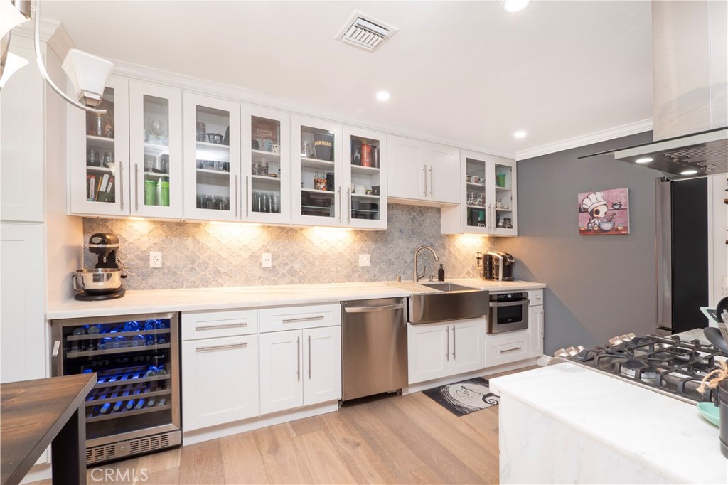 Welcome to this beautifully updated condo in the heart of Covina. This move-in ready home features a modern kitchen with updated counters, new flooring throughout, and refreshed bathrooms that add both style and comfort. The spacious layout offers a natural flow from the kitchen into the living areas, perfect for both everyday living and entertaining. Conveniently located near shopping, dining, and entertainment, this condo provides the ideal balance of comfort and convenience.