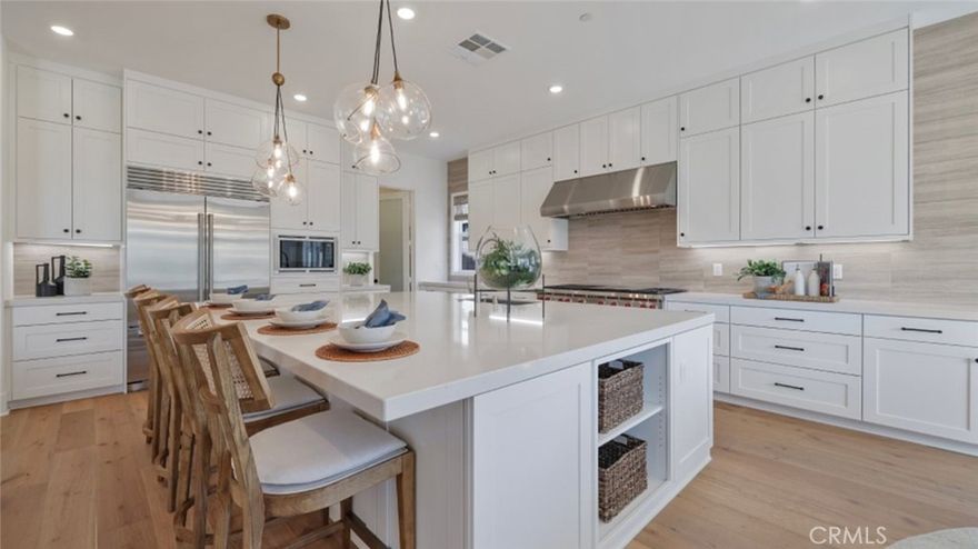 Discover luxury and functionality in this stunning 4,697 sq ft home, featuring 5 bedrooms, 5 full baths, 2 half baths, a bonus room, and a 3-bay garage.
 
This stunning home showcases a bedroom with its own bath on the first level, which is ideal for Guests, along with an Office area.  An inviting open floorplan includes a Great Room, and a chef's kitchen with a spacious walk-in pantry, along with Wolf appliances and a Sub-Zero refrigerator!  The oversized kitchen island, with quartz counters, makes for easy entertaining!  The sliding glass doors opens up to the California Room with a cozy fireplace, seamlessly extending your living space into the backyard.   
The Owner's Suite is a retreat in itself, featuring a luxurious bath and shower, and an expansive walk-in closet.  This home is located at the highest top of the neighborhood on a double cul-de-sac street with open views of the hillside that maximizes privacy!

This beautiful home is located in a gated community with restaurants, shopping, coffee shops and grocery stores all nearby
 .
Every detail in this home has been crafted for comfort, style, and versatility—ready to welcome you home!.