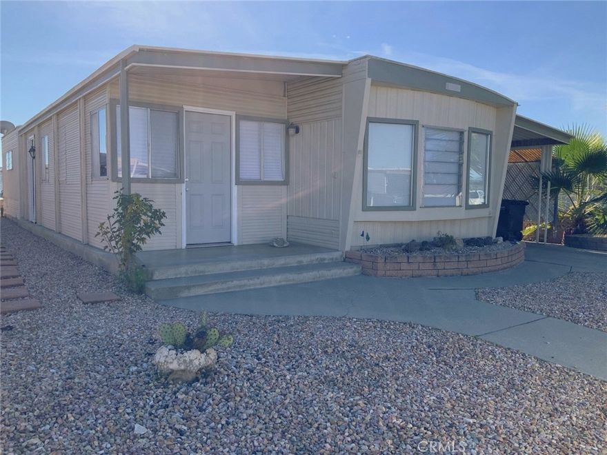 This cutie is a must to see.  It was upgraded with granite counters, beautiful tile flooring, new bathroom tile and shower.  BONUS Room is a great area for guest and entertaining.  Located in the Sierra Dawn Estates which includes so many amenities! 5 REASONS YOU'LL LOVE this Home: 1) you OWN THE LAND so no space rent! 2) MOVE-IN Ready with a functional layout that makes everyday living simple and comfortable. 3) BONUS Room right at the entry, offering extra usable space and versatility 4) ACCESS to four clubhouses, each with a pool and spa, recreation rooms, pickleball, dog park, plus community activities and gatherings 5) Attractive PRICE of $144,888 with flexible potential for the right TERMS.
