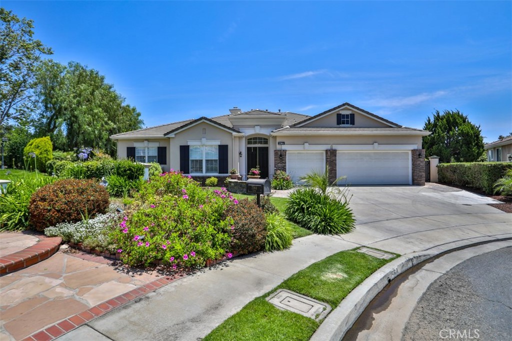 Nestled in the prestigious Marshall Canyon Estates, this exquisite estate seamlessly blends luxury, privacy, and thoughtful design to create an exceptional living experience. Offering 5 bedrooms, a dedicated office, and 5.5 bathrooms, this home caters to the most discerning tastes—perfect for grand entertaining or private relaxation.
The chef’s kitchen has been completely remodeled and features custom cabinetry, a Thermador One-Touch refrigerator, 6-burner range with griddle, oven/microwave combo, built-in coffee maker, and beverage refrigerator. A balcony off the kitchen offers sweeping views of the private backyard, natural preserve, and valley beyond.
The master retreat is a sanctuary of comfort and elegance, highlighted by a cozy sitting area with a two-sided fireplace, spa-inspired en suite bath with a soaking tub, oversized walk-in shower, private water closet with Toto bidet, and a spacious custom walk-in closet. Expansive windows frame picturesque views of the surrounding landscape and preserve.
Upstairs, you'll find a guest suite, office, and formal dining room perfect for hosting large gatherings. The lower level offers three additional bedrooms and three baths, including a generous en suite with walk-in closet. A versatile bonus/game room opens directly to the beautifully landscaped backyard, creating the ideal setting for indoor-outdoor living and entertaining.
Step outside to your private, resort-style oasis featuring a Pebble Tec pool and spa, new patio cover, and meticulously landscaped grounds. The backyard is bordered by a city-owned tree preserve, ensuring a serene sense of privacy. A newly installed storage shed with matching concrete tile roofing completes the outdoor space.
Notable recent upgrades include:
Completely rewired, remodeled kitchen
Extensive interior electrical updates
Newly installed sewer system extending to the street
Three brand-new HVAC systems
New storage shed with matching tile roof
This Marshall Canyon estate offers an unparalleled lifestyle with sophisticated living spaces, modern amenities, and a private, tranquil setting—truly a rare offering.