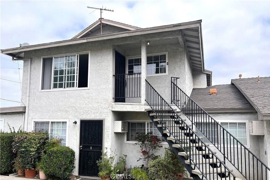This DOWNSTAIRS unit features 2 bedrooms and 1 baths with approximately 850 square feet of living space. Features of the home include freshly painted, and dual pane windows. Spacious living room at the entry. Kitchen includes gas range, plenty of cabinetry for storage, beautiful countertops and breakfast nook. Master Bedroom includes bathroom with walk-in shower. Additional bedroom down the hall. This home also includes 1 car garage with additional parking space, and community laundry. Conveniently located close to the Eisenhower Park which includes playgrounds and fishing pond, Kaiser Permanente, restaurants, shopping, entertainment and the 91/55 Freeway. *Pets will be considered*