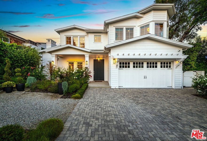 Welcome to 4402 Ledge Ave, a stunning Cape Cod-inspired estate in the heart of Toluca Lake. Built on the land once owned by the legendary Bob Hope. This luxurious 5 bed, 5.5 bath home offers exceptional design and quality throughout. A bright, open floor plan with grand ceilings creates seamless indoor-outdoor flow, ideal for entertaining and embracing the Southern California lifestyle. The gourmet kitchen features top-of-the-line appliances and custom finishes. A state-of-the-art home theatre and spacious living areas elevate comfort and style. Eco-conscious buyers will appreciate fully owned solar panels, Tesla batteries, and wall charger. The private backyard oasis features a sparkling pool, spa, lush landscaping, and a cozy outdoor fireplace. Located near the studios, top private schools (including Campbell Hall & Harvard-Westlake), and the shops and restaurants of Riverside Dr. This rare offering blends history, elegance, and modern convenience in one of L.A.'s most desirable neighborhoods.
