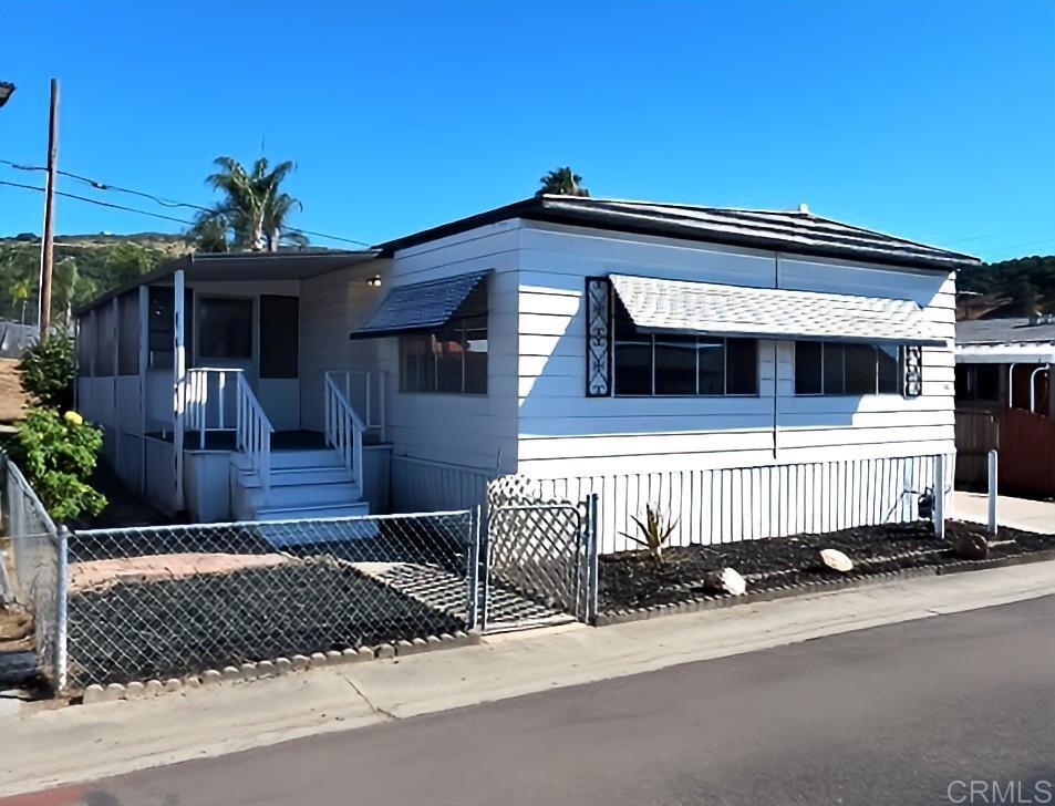Located in one of the most sought after Resident Owned All Age communities! This beautifully updated mobile home that offers comfort and style for all ages! Featuring a delightful patio room perfect for relaxation or entertaining, this home boasts brand-new appliances, fresh paint, and new flooring throughout. The roof has been freshly resealed, ensuring peace of mind for years to come. Located in a welcoming resident-owned park with LOW monthly HOA, this is a fantastic opportunity for affordable living without sacrificing quality. Don’t miss your chance to make this lovely home yours! Park amenities include a pool, club house, recreation facility and more!