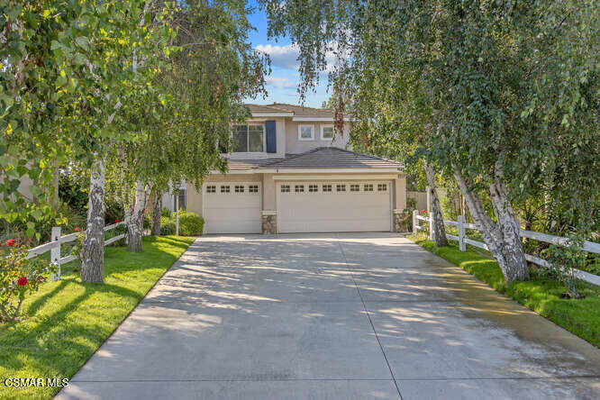 Nestled in the heart of Newbury Park, within the gated community of California Oakbrook, this exquisite home offers an unparalleled blend of luxury, privacy, and convenience. Tucked away on a tranquil cul-de-sac street perfect for families or anyone seeking a serene environment. Step inside to discover a world of modern elegance, with brand new wide plank neutral wood-like flooring flowing seamlessly throughout the downstairs, creating a warm and inviting atmosphere. The stairs, covered in plush new carpeting, lead to the upper level where comfort and style continue. The gorgeous, expansive kitchen features a large center island with granite counters, abundant storage, and a layout designed for both everyday meals and grand entertaining. Four bedrooms and three bathrooms, this home provides ample space for all. Downstairs bedroom is a flexible space ideal as a guest room, home office, or playroom to suit your needs. Step outside to a vast backyard, perfect for outdoor gatherings, gardening, or simply basking in the California sunshine. A charming white picket fence lines the front driveway adding timeless curb appeal to this already captivating property. Don't miss the chance to make this stunning property your own. Great location close to shopping, hiking/biking trails and freeway access!