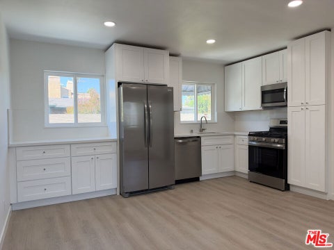 Photo of 11500 Riverside Drive #4, North Hollywood, CA 91602 (MLS # 26996055)