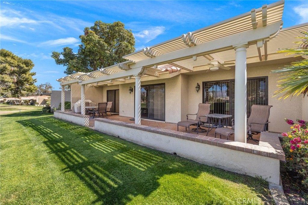Photo of 77050 Pauma Valley Way, Palm Desert, CA 92211 (MLS # PW25242436)