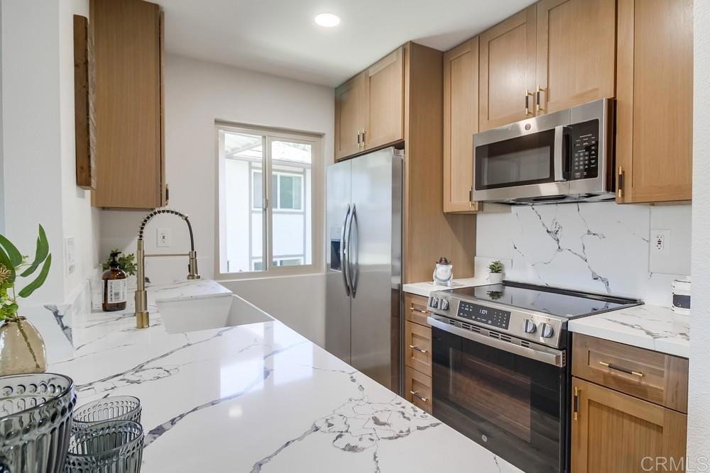 Completely remodeled and 100% move-in ready, this San Carlos unit is just a short walk to Mission Trails Regional Park! Enjoy a modern and stylish interior featuring new luxury vinyl plank flooring, updated kitchen and bathroom cabinets, quartz countertops, a matching backsplash, and stainless steel appliances—including a refrigerator. The open-concept layout is light-filled and functional, enhanced by new retro-fit windows, ceiling fans, and recessed LED lighting throughout. The bathroom has been tastefully updated with clean finishes and quality fixtures. This home truly feels brand new. Located in a desirable community near hiking trails, shopping, and dining, it offers the perfect blend of outdoor access and everyday convenience. All major upgrades have been done—just bring your furniture and start enjoying your new home from day one. Don’t miss this opportunity. Schedule a showing today!