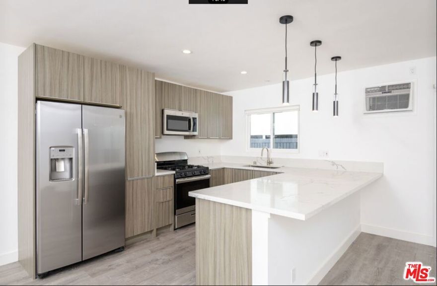 **MOVE IN SPECIAL**  **MOVE IN TODAY AND PAY NO RENT UNTIL JANUARY 1ST** Welcome to Laurel Ave, one of West Hollywood's most sought after streets, where you will find this luxury one bedroom, one bathroom, fully remodeled unit with no detail forgotten. Enter into the light and bright open floor plan with wide plank hardwood floors throughout. Entertain from the kitchen to the living room in the newly appointed European style space, complete with brand new stainless steel appliances, including refrigerator, dishwasher, microwave and gas range and oven. Modern pendants complete the ambiance as you host gatherings in your dining area. Enjoy ample storage and closet space along with an oversized Master Bedroom. Premium finishes and doors add style and contrast to the modern white space, and recessed lighting throughout along with in-unit washer and dryer complete the comforts of your new home. Complex has undergone a full restoration, including completion of mandatory earthquake retrofitting, new plumbing, freshly painted exterior, common areas, and more.