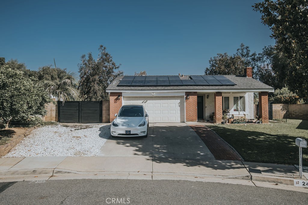 Welcome to your dream home in the heart of Corona. This beautifully maintained single story offers the perfect blend of comfort, privacy and energy efficiency. House features 4 bedrooms and 2 bathrooms with laminate flooring throughout, sitting in the cul-de-sac with no rear neighbors. Step inside to find a bright open layout, this home is looking for new families to create more core memories to come. The home boasts a brand new roof and solar system with 29 panels and producing 16,881 kw, giving you a significant savings on your energy bills. Half of the backyard is designed with artificial turf for low-maintenance living and the half is ready for your dream fruit garden, complete with three automatic drip systems already installed. Located just minutes from scenic hiking trails and local parks, this home is ideal for outdoor enthusiasts and families alike. Don't miss the opportunity to own this move-in ready gem in prime location of Corona. Schedule your private showing today.