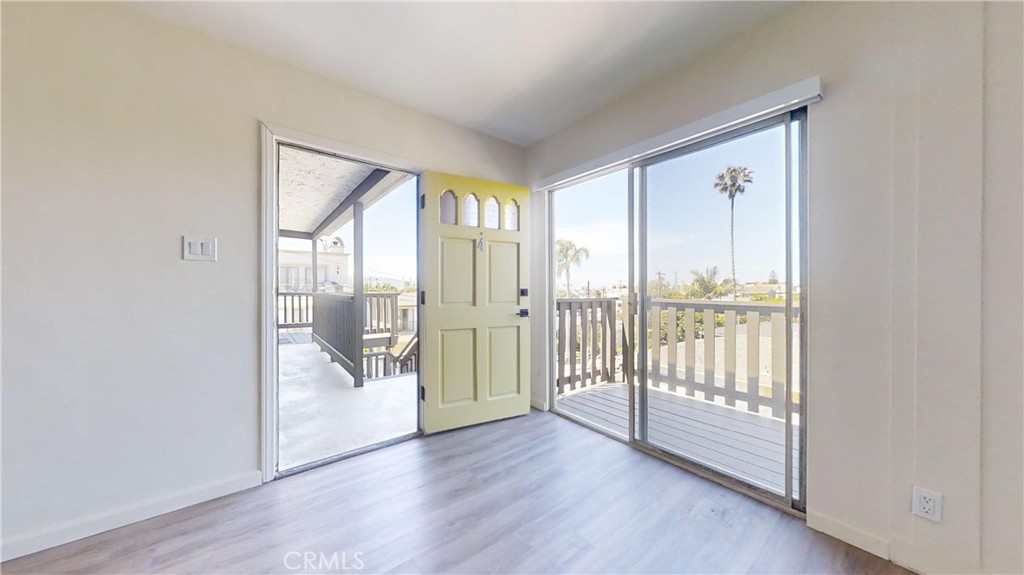 Location Location Location!!! That’s the key for this remodeled, very spacious 2 Bedroom 1 Bath, top floor unit, just a few short blocks to the water, and Pier Ave restaurants, west of PCH. Luxury vying plank floors, new plumbing, hardware, custom pant, fixtures, tile, custom lighting and more. Private deck (with a small ocean view and Valley overview), and access to a grassy communal yard. This property shows pride in rentership that the most discerning occupant can appreciate. New tree door fridge, and LG Range and microwave. Formal Dining area with views of the yard. Kitchen has opening to living room. Rear door leads from kitchen to rear stairs. Great airflow from the sea air. Massive bedrooms with huge closets, private stackable Landry area Luxury is yours. Lots of storage here. And a shared two-car garage with high ceilings for extra storage. Hot water included in rent.