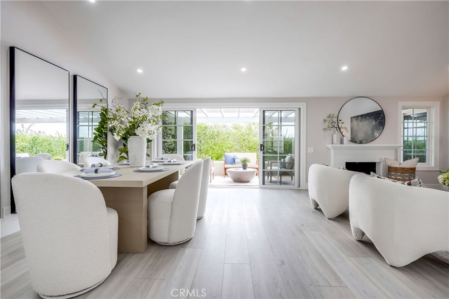Newly remodeled and thoughtfully upgraded throughout, this prized single level beauty is a private oasis, ideally situated at the end of a quiet cul-de-sac, a Crown Jewel superbly located in the highly desirable 55+ Monarch Summit II community, offering the very best in coastal living! Pass through the private gated courtyard welcoming you to the home. Step inside and soak in the light filled freshly painted interior boasting new wide plank laminate floors, LED recessed lighting, vaulted ceilings, and an open concept, well-designed, floor plan with direct access to outdoor spaces from every room, creating a superb living environment. The living room is the perfect gathering space around the centerpiece fireplace and is open to the dining area with direct access to the backyard patio creating an ideal indoor-outdoor living space perfect for entertaining. The sparkling kitchen is a dream with new Quartz countertops, updated hardware and pulls, matching stainless steel appliances, new faucet, and a sunny breakfast nook which opens to the front courtyard, a soothing space for morning coffee with a loved one. The primary bedroom suite is a tranquil retreat with vaulted ceilings, direct access to the backyard patio, two closets with updated closet doors and built-in closet organizers, and a sleek updated primary bathroom with Quartz topped dual vanity, new faucets and hardware, updated lighting, and a gorgeous, newly remodeled step-in shower with frameless glass enclosure, custom tile surround, and new shower fixtures. The secondary bedroom also has high vaulted ceilings, sliders opening to the private front courtyard, and mirrored closet doors. The guest bath has been stylishly updated with new faucet and fixtures, updated lighting, and a vibrant step-in shower enclosure with frameless glass enclosure, custom tiled surround, and new shower fixtures. The private backyard patio with peek-a- boo views takes full advantage of the cool ocean breezes providing the perfect peaceful setting for relaxing and BBQing with friends and family. The convenient direct access two car garage boasts epoxy floors, pull-down ladder access to attic, and built in storage cabinets. Community amenities include clubhouse, pool, and spa, perched atop one of the tallest coastal peaks with spectacular views! Close to hiking & biking trails, local viewpoints including Seaview Park Trail & Overlook, golfing, shopping, dining, and just minutes from world class beaches & Dana Point Harbor.