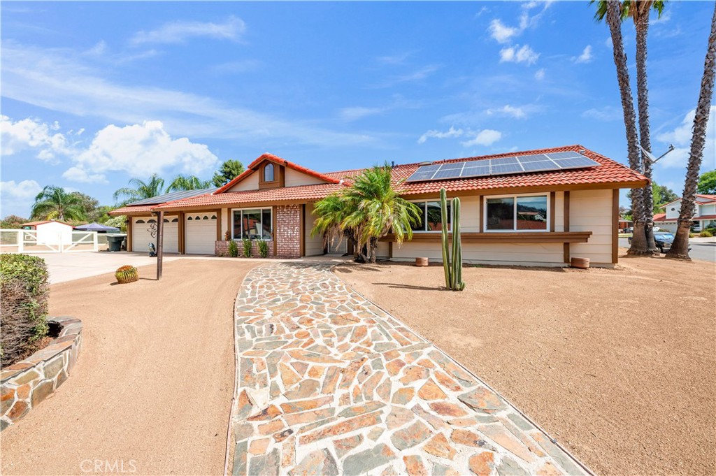 Looking for a home that checks off all the boxes, look no further. The curb appeal on this home is hard to miss. These 4 bedrooms are oversize and all come with very large closets. You walk into the very comfortable living room, the kitchen has beautiful Corian counter tops. The family is perfect for kicking back or use it for your dining area. The back yard is like it's very own oasis, plenty of room to party, tons of seating/game area/BBQ/ Covered patio and of course the pool. This is a lot that boasts over 18,000 sq ft. Some of the yard is being used as a RC racetrack but has the opportunity to be a ADU and ADU jr. You want to split the lot and build another home, this neighborhood allows it (double check with the county please) Don't miss this home in one of the nicest communities in Wildomar.
Check this out:
Low Low tax rate
Paid off solar
New Vinyl windows throughout.
Newer flooring
Walk to school.