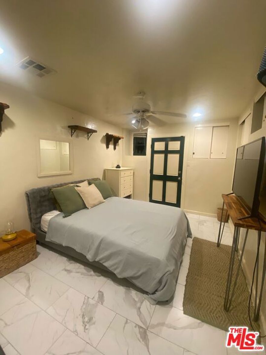 This is a Studio attached to a single family home. with access to laundry room, front porch, backyard, and 1 dedicated parking space. Beautiful cottage style Hollywood Hills location on a great street. Close proximity to Restaurants, shops and freeways. Offered as. furnished but can be rented unfurnished as well.