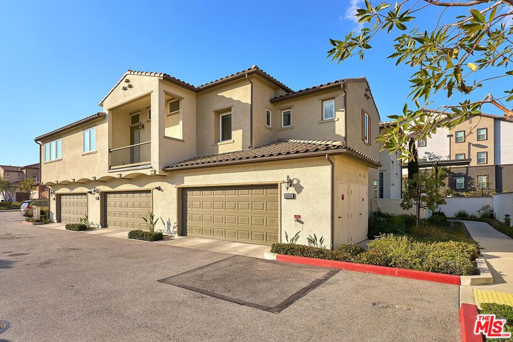 MUST SEE! This is the largest plan home in the prestigious Aldea community. This beautiful home has an open and bright layout with 4 bedrooms and 3 bathrooms! This gorgeous home includes stainless steel appliances, recessed lighting, massive island, and a huge outdoor patio. Don't forget about the 1 bedroom downstairs that would be perfect for the in laws or any guests. There is a 2 car garage conveniently attached to the home and leads right to the kitchen. This gated home sits in the rear portion of the community so it feels more secluded and has more of a privacy compared to other homes in the community. This luxury community has many amenities, huge resort style pool, spa, BBQ grills and also are for kids to play. The location of this home is conveniently located nearby shopping plazas and very convenient to the 118 FWY. You don't want to miss out on this one!