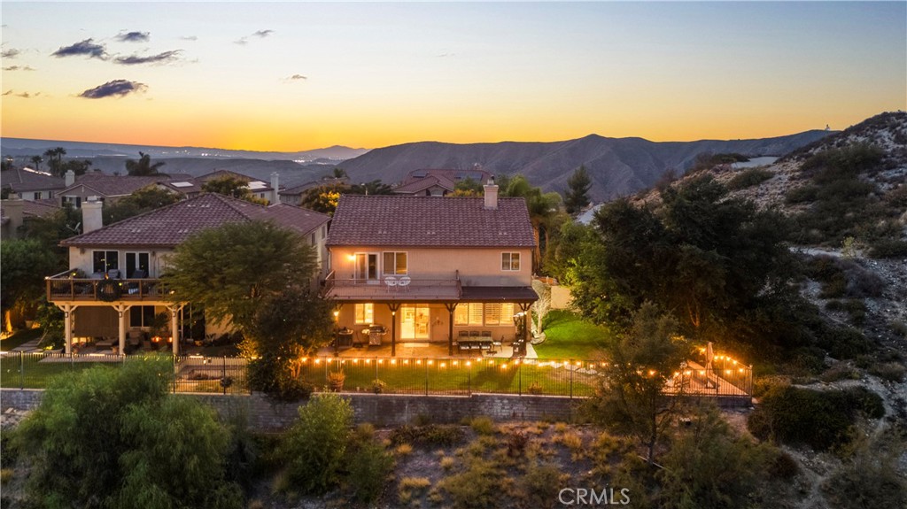 Offers Due Oct. 10th at 5pm ** Sitting atop the coveted neighborhood of Sunset Heights, this stunning Padre-built home offers the perfect blend of elegance, comfort, and breathtaking views. Nestled at the end of a quiet cul-de-sac on a sprawling 7,725 sq. ft. lot, enjoy spectacular 180° panoramic views of the mountains and twinkling city lights—a true entertainer’s dream.
Step inside through the grand double-door entry and be greeted by soaring ceilings, abundant natural light, and a striking two-sided fireplace that creates warmth and charm. The gourmet kitchen opens seamlessly to the dining area and living space, ideal for gatherings and everyday living.
Upstairs, the luxurious master suite boasts dual walk-in closets, a spa-like tub, and a massive private balcony where you can unwind while taking in the dazzling night views. The backyard is a showstopper, featuring lush landscaping, mature palms, and fruit trees, along with stamped concrete patios and a picturesque gazebo—perfect for hosting or simply relaxing with unobstructed views, views, views!
views - high ceilings - duel fireplace - recessed lights - open floor plan - cul-de-sac - new kitchen - on suite master with spa - one bedroom downstairs