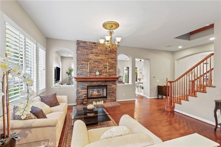 Sitting atop the coveted neighborhood of Sunset Heights, this stunning Padre-built home offers the perfect blend of elegance, comfort, and breathtaking views. Nestled at the end of a quiet cul-de-sac on a sprawling 7,725 sq. ft. lot, enjoy spectacular 180° panoramic views of the mountains and twinkling city lights—a true entertainer’s dream.
Step inside through the grand double-door entry and be greeted by soaring ceilings, abundant natural light, and a striking two-sided fireplace that creates warmth and charm. The gourmet kitchen opens seamlessly to the dining area and living space, ideal for gatherings and everyday living.
Upstairs, the luxurious master suite boasts dual walk-in closets, a spa-like tub, and a massive private balcony where you can unwind while taking in the dazzling night views. The backyard is a showstopper, featuring lush landscaping, mature palms, and fruit trees, along with stamped concrete patios and a picturesque gazebo—perfect for hosting or simply relaxing with unobstructed views, views, views!
views - high ceilings - duel fireplace - recessed lights - open floor plan - cul-de-sac - new kitchen - on suite master with spa - one bedroom downstairs