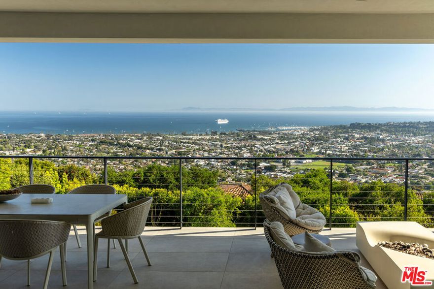 Perched atop Santa Barbara's Riviera, this newly built, one-of-a-kind contemporary masterpiece offers unparalleled elegance, cutting-edge technology, and seamless indoor-outdoor living. Constructed by Allen Construction and enhanced by Cornerstone Landscapers, this exceptional residence showcases breathtaking panoramic ocean, city, and island views from every level. Expansive floor-to-ceiling sliding doors seamlessly fold, opening the home to sweeping vistas from the outdoor terrace. The interiors boast soaring 10-foot ceilings, wide-plank wood floors, automated shades, Lutron lighting, and a state-of-the-art Savant smart home system. The gourmet Italian kitchen is a chef's dream, featuring sleek cabinetry, Wolf and Miele appliances, Sub-Zero refrigeration, and a butler's pantry with ample storage. The primary suite is a private sanctuary, offering blackout shades and a serene ocean-view terrace. The spa-inspired marble bath is designed for ultimate relaxation, complete with radiant heated floors, a soaking tub with breathtaking views, and a heated towel rack. Designed for resort-style living, the 15' x 45' infinity-edge pool and spa are complemented by an outdoor kitchen, automated sunshades, and lush landscaping. Additional highlights include a media room with a bar, a home gym with an infrared sauna, a security system, solar panels with LG Powerwall backup, and extensive drainage and irrigation systems. A true Riviera masterpiece, blending luxury, innovation, and sustainabilityjust minutes from downtown Santa Barbara.