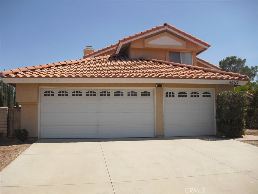 Great Rancho Vista area home - new paint - new flooring throughout all the house - 3 bedroom upstairs and one down stair can be use as office -large master bedroom with fireplace and private bath with garden tub and a separate shower - large lot big backyard with palm trees - 3 car garages - block wall fencing and a tile roof - and much more ....