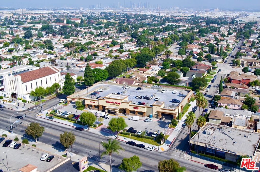 Realty Group Advisors is pleased to present 3111 E Florence Avenue for sale in Huntington Park, California. This freestanding, single-tenant, 28,000-square-foot retail building sits on a 1.4-acre lot and is fully leased to Smart & Final, one of the longest operating food retailers in the United States. The property features excellent visibility at the signalized intersection of Florence Avenue and Mission Place, with a combined average daily traffic count of more than 33,000 vehicles. 3111 E Florence Avenue is easily accessible to consumers via I-710 to the east, I-110 to the west, I-105 to the south, and I-10 and I-5 to the north. Additionally, a bus stop along a 38-stop bus route is located directly in front of the building, and Dial-A-Ride taxi services are readily available. This accessibility allows the property to reach the strong surrounding demographics in the Huntington Park area, which is one of the most densely populated markets in Southern California. Within a five-mile radius of the building live more than 1 million residents, who contribute to a consumer spending total of over $7.2 billion. Located just seven miles south of Downtown Los Angeles, the property is situated along a well-established urban street retail district. It draws from the popular surrounding communities of Lynwood, Bell, and Maywood. With its ease of access and strong surrounding demographics, 3111 E Florence Avenue offers an excellent e-commerce-proof investment opportunity in the Gateway Cities district of southeastern Los Angeles County.