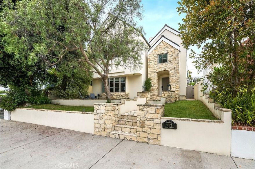 Welcome to 755 31st Street, where classic charm meets modern coastal living on one of the most sought-after tree-lined streets in Manhattan Beach. Elevated on a gentle hill, the home makes a beautiful first impression with its standout curb appeal. A quiet cul-de-sac behind adds privacy and a true beach family vibe. Inside, the airy foyer with soaring ceilings and a stunning new staircase is filled with natural light from skylights and high windows. The remodeled interiors feature rich, refinished ceiling beams that add warmth and style throughout. The chef’s kitchen shines with custom cabinetry, gorgeous counters, and top-tier appliances—perfect for entertaining.  Four spacious bedrooms each have their own en-suite bath and generous closet space. The custom kids’ playroom, complete with a climbing gym and swing, is pure fun. The primary suite feels like a private retreat with vaulted ceilings and a spa-like bath.  Located west of Laurel and in the coveted Grand View Elementary district, this home offers the best of Manhattan Beach living.