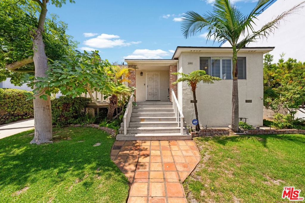 Set high on the coveted Mar Vista Hill, this original 2-bedroom plus den home offers stunning city and treetop views along with rare add-value potential. One of the few remaining properties in the area not extensively remodeled, it presents a blank canvas for your vision yet remains comfortably livable as-is. Enjoy an updated kitchen, double detached garage, and a beautiful patio and backyard perfect for entertaining or relaxing under the California sun. Located in the desirable Mar Vista school area and just moments from the Airport Dog Park, Ocean View Farms, North Venice Ball Park, and Hive Coffee House.
