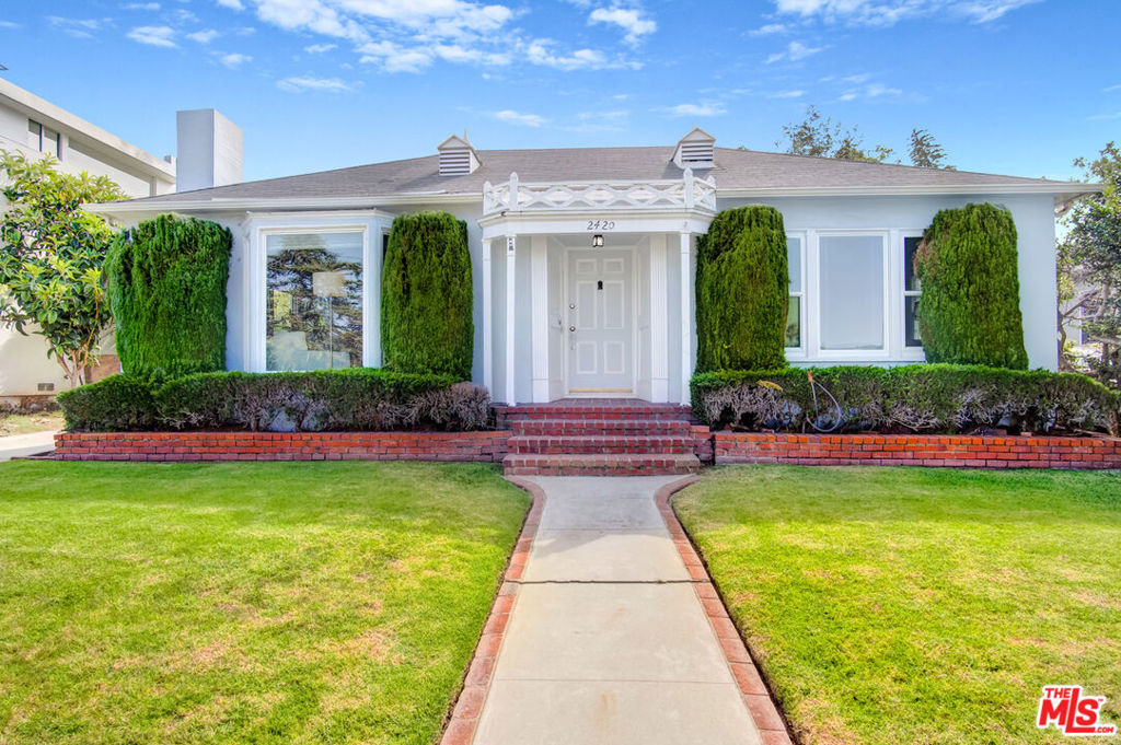 Imagine designing your dream home in one of Santa Monica's most desirable neighborhoods! Set on a serene street in Sunset Park, this 2-bedroom, 2-bath single-level residence offers a blend of livable comfort and exciting potential. Whether choosing to personalize its current charm or build new from the ground up, it's ready for your creative inspiration. Crisp landscaping frames the entry leading to a bright living room with a classic fireplace, custom shelving, and a picture window that floods the interior with natural light. The dining corner's wainscoting and built-in china hutch add timeless character, while the kitchen's ample cabinetry and sleek countertops provide a functional workspace. Your primary suite offers an ensuite with a window-side soaking tub, ideal for quiet moments. Outside, a brick patio and verdant lawn flow to a tree-shaded veranda through a leafy arbor, perfect for al fresco dinners or laid-back weekend BBQs. A detached garage, extended driveway, and laundry nook deliver convenience. Positioned just minutes from sandy beaches, the Pier, 3rd Street Promenade, and major commuter routes, come see what makes your vision worth pursuing here!