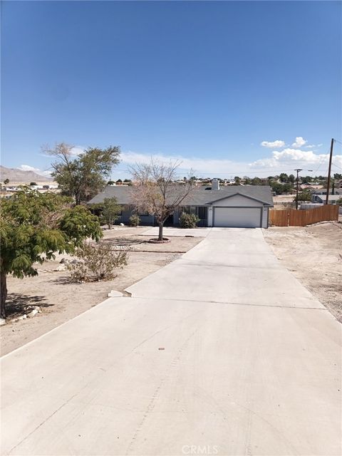 Photo of 15975 NW Village Dr Dr, Victorville, CA 92394 (MLS # SB25201491)