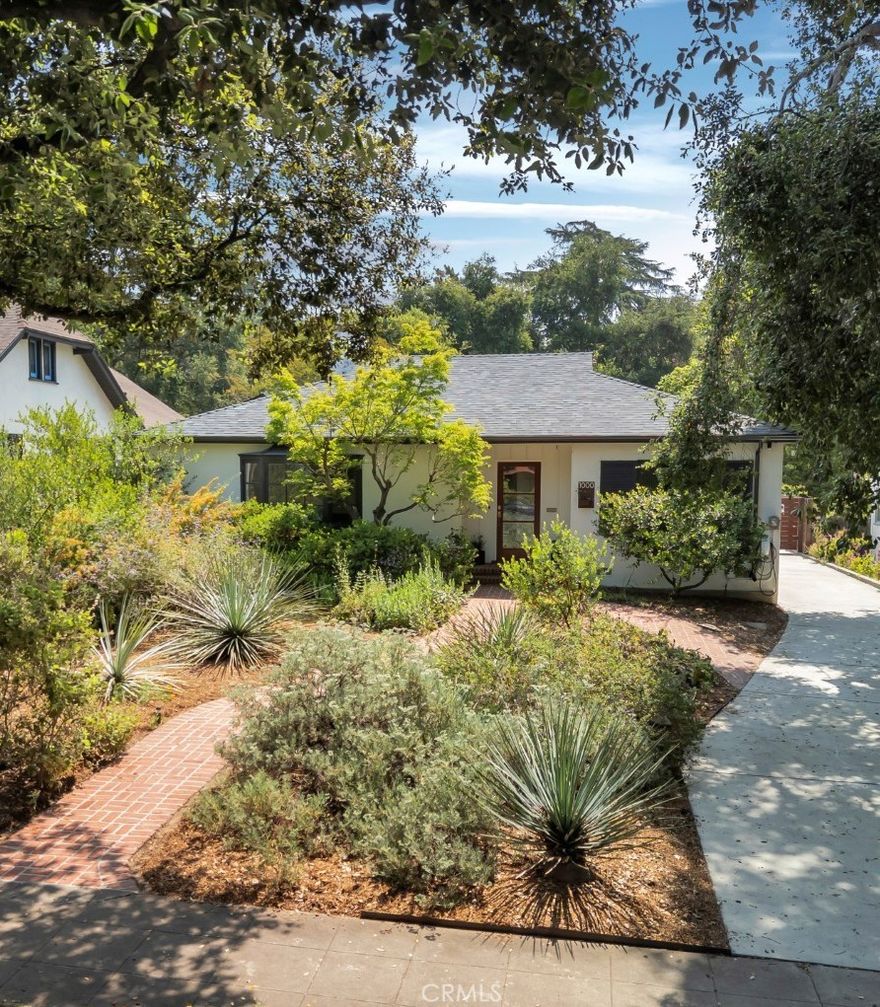 Welcome to this Bungalow Heaven house with an ADU! Come and visit this gorgeous home in the highly desired area of the Historic Bungalow Heaven. Located on a tree lined street, as you pull up you will notice the native plant landscaping and long driveway. Upon entering take note of the beautiful wood floors and spacious living room with a decorative fireplace and plenty of natural light coming from the bay window. This 3 bedroom, 2.5 bath home has efficiently used its space and has plenty of storage spaces throughout. The bathrooms are beautifully updated. The kitchen is perfect for any of your culinary endeavors with sandstone counters, stainless steel appliances with the entrance to the backyard. The exterior of this home is thoughtfully designed for California-style outdoor living, featuring a serene pergola with black net curtains, remote-controlled infrared heaters, soothing fountains, a jacuzzi, fire pit, ambient lighting, fruit trees, and dedicated garden spaces. Tucked at the rear of the property is a permitted Accessory Dwelling Unit (ADU) with its own address is a terrific flexible space with an open floor plan, kitchenette, and full bathroom. Whether you’re hosting guests, working from home, generating rental income or just wanting extra space, the ADU can add value and versatility to your new home. Solar panels and an EV charger make this home efficient as well as beautiful. More upgrades to note are both the roof and HVAC systems were installed in 2022, gutters on the main house & ADU, 2 sheds, Stil 7 hot tub and much more!