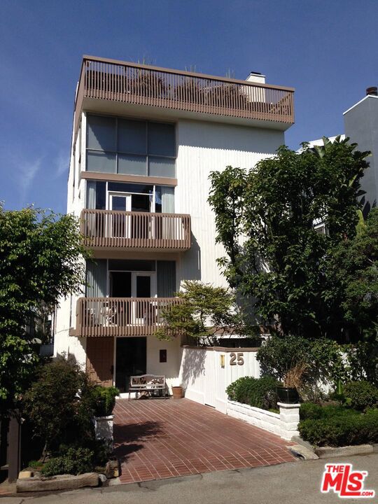 Steps to the Sand! Escape the Venice Crowds. The Marina Peninsula Alphabet Streets are akin to having your own private beach. Updated, Modern, 2 bedroom + 2 Bath w/ balcony ocean view and 2 Car garage parking. Refinished 100% hardwood floors throughout, brand new energy efficient recessed lighting, stainless appliances, Bosch refrigerator. Glorious Living Room Gas Fireplace. Cozy up on beach nights! (One pet considered)