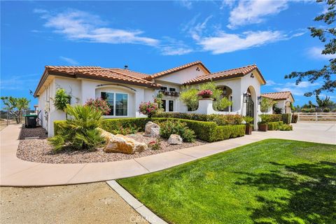 Photo of 8311 Macron ST, Oak Hills, CA 92344 (MLS # HD26105554)