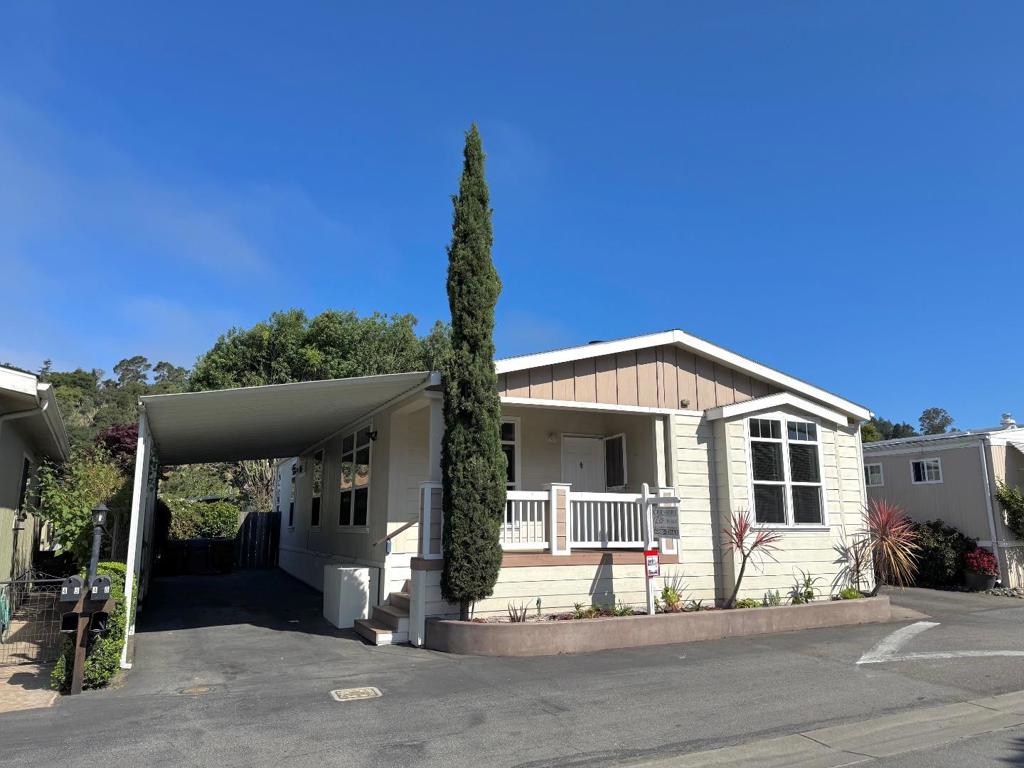 Welcome to this charming 3-bedroom, 2-bathroom home located in the beautiful city of Aptos. This residence offers 1,502 sq ft of comfortable living space, perfect for a variety of lifestyles. The kitchen is a standout feature, equipped with granite countertops, a dishwasher, exhaust fan, garbage disposal, and refrigerator, making it a functional and stylish space for cooking and entertaining. Sits on it's own private parcel, you own the land. Clubhouse, pool, spa and play-yard is only 100 feet away. You'll appreciate the thoughtful design elements like skylights that bring natural light into the home and a walk-in closet providing ample storage. The interior features a mix of carpet, laminate, and vinyl/linoleum flooring, offering both comfort and durability. Stay warm during cooler months with the central forced air heating and enjoy the cozy ambiance of the fireplace. The laundry setup includes a washer and dryer for your convenience. This home falls within the Pajaro Valley Unified School District, making it a practical choice for those considering educational options. Don't miss the opportunity to make this Aptos home your own!