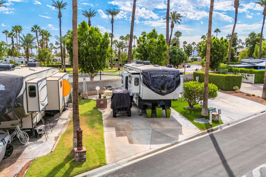 I am pleased to announce an exceptional new listing, Lot 8. This highly sought-after property is situated in a prime location within our resort, offering both desirable positioning and convenient access to essential facilities.This premier lot boasts peek a boo views of the golf course, directly accessible from the comfort of your RV. Its advantageous orientation is ideally suited for a front-living RV configuration, designed to maximize your enjoyment of the picturesque surroundings.Positioned directly opposite the beautiful 10th hole, new owners will be perfectly poised to experience truly breathtaking sunsets, creating memorable evenings. Furthermore, the lot offers easy walking access to a comprehensive list of resort amenities, including our on-site restaurant, a fully equipped fitness center, and fully maintained shower and restroom facilities.Representing an outstanding value, I encourage prospective buyers to submit an offer now. Secure this unique property and immerse yourself in the full range of amenities and experiences Outdoor Resorts has to offer for the upcoming season.