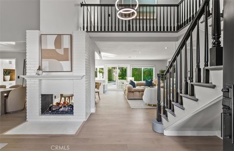 Photo of 9882 Kings Canyon Dr, Huntington Beach, CA 92646 (MLS # OC25267086)