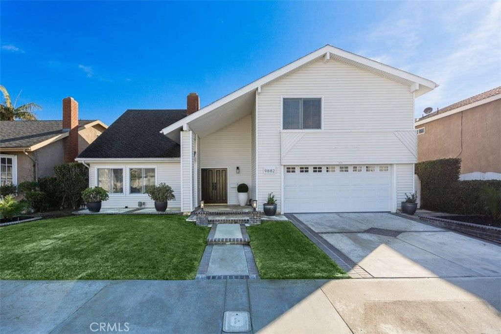 Photo of 9882 Kings Canyon Dr, Huntington Beach, CA 92646 (MLS # OC25267086)