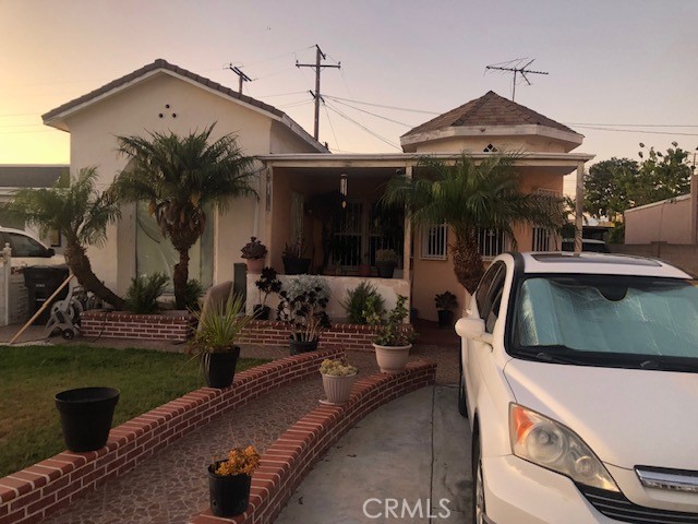 Super cute Spanish style home located in the city of Huntington Park! Central location close to parks and shopping. This home has 2 bedrooms and 1 bathroom, and plenty of space for parking within the property. The backyard has a covered patio, perfect for entertaining. Single car garage has been converted into a studio apartment with its own bath and kitchen facilities. The property is completely fenced and perfect for growing families. Come take a look for yourself!