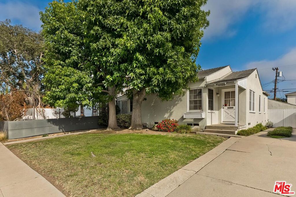 Charming Mar VistaDel Rey Bungalow with Endless Potential! Nestled in a vibrant neighborhood surrounded by trendy shops and restaurants, this delightful bungalow offers the perfect canvas to create your dream home. The sun-filled living room features original hardwood floors hidden beneath the carpet, ready to be restored to their former beauty. The kitchen retains its vintage charm with original wood cabinetry. Step outside to a spacious backyard oasis, complete with mature fruit treespeach, pear, tangerine, lemon, orange, and figproviding fresh, homegrown flavors year-round. The detached garage presents exciting possibilities, whether you envision it as a home office, creative studio, or fully realized ADU. Situated in a coveted Westside location, you'll be just minutes from Marina del Rey, the beach, and all the best that coastal living has to offer.