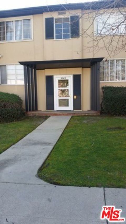 Photo of 4121 Santo Tomas Drive #A, Los Angeles, CA 90008 (MLS # 25598447)