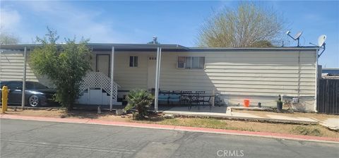 Photo of 22838 Bear Valley Road #73, Apple Valley, CA 92308 (MLS # HD26057737)