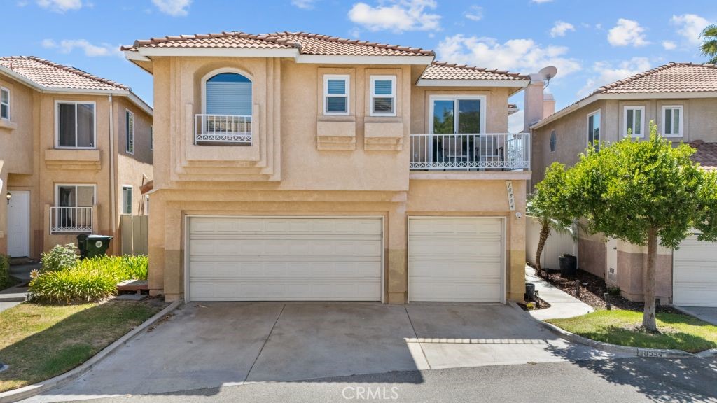 Welcome to the desirable Shangri-La neighborhood of Canyon Country. This 2,526 sq ft home has been thoughtfully redesigned with high-end finishes, energy-efficient systems, and smart-home upgrades throughout. The open-concept floor plan was created by removing three walls and reinforcing with custom foundation piers, creating a spacious and inviting living space. This home features luxury click-lock laminate flooring, custom handmade steel stair railings, new baseboards, and fresh interior paint with three professionally sprayed coats. The chef’s kitchen has been completely redesigned with custom cabinetry, a commercial-grade 48” double oven and hood, and over $50,000 in custom quartz countertops—quadrupling the original counter space. The primary suite offers a luxurious retreat with a custom walk-in shower, designer linear drain, glass enclosure, standalone whirlpool tub, upgraded vanity, mirrors, lighting, and a private toilet room. All three bathrooms have been upgraded, including reglazed tile in the secondary bath and new toilets throughout. This home is loaded with smart and energy-efficient features, including a brand-new 200-amp electrical panel with solar integration, a high-efficiency HVAC system with heat pump and whole-house air filtration, a high-efficiency tankless water heater with recirculating line, and a whole-house water filtration system plus a separate RO system for the custom aquarium. Additional upgrades include Milgard Tuscany dual-pane windows and sliding doors, full plumbing re-pipe, smart locks on all exterior doors and upstairs interior doors, programmable smart recessed lighting, and a Tesla EV charger with 10 additional garage outlets on dedicated subpanel breakers. Other standout features include a built-in saltwater aquarium, a stacked-stone fireplace in the living room, sound-dampening designer wall treatments, new ceiling fans throughout, and a whole-house Ring security system with door and window sensors. The garage has also been fully painted and upgraded with modern conveniences. This home offers the perfect blend of comfort, function, and style—move-in ready and unlike anything else on the market. Also, available for rent for $5,500 a month.