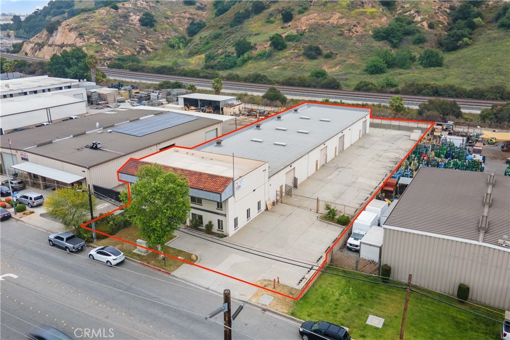This ±13,886 square foot freestanding industrial building with gated yard is located in the heart of Pomona’s industrial district and zoned M-2, allowing for a wide range of heavy industrial uses. The property features heavy power with 800 amps, 480/277 volt, 3 phase, 4 wire electrical service, along with two exterior platform high docks and five ground-level loading doors measuring 12’ x 12’. The warehouse offers a 14-foot ceiling height, energy-efficient sensor LED lighting, air lines installed for a compressor system, natural gas availability, and a fire sprinkler system. The property also boasts excellent street frontage with strong exposure, making it ideal for signage and branding. With quick access to I-10, CA-71, and CA-57 freeways, it is centrally located near the Inland Empire, Los Angeles, and San Gabriel Valley markets. The space is ideal for heavy manufacturing, CNC manufacturing, contractor’s yard or warehouse, equipment rental, building material wholesalers, flooring distributors, kitchen cabinet wholesalers, and automotive-related businesses including auto collision centers, auto body shops, and Cannabis use pre-approved. Additional amenities include one ground-floor restroom with a shower, a second-floor bathroom with a bathtub, the potential for a drop ceiling HVAC system in the warehouse, a built-in kitchen, washer and dryer hookups, and excellent Feng Shui throughout the property. Great for Owner user. Easy to Show. Text / Call.