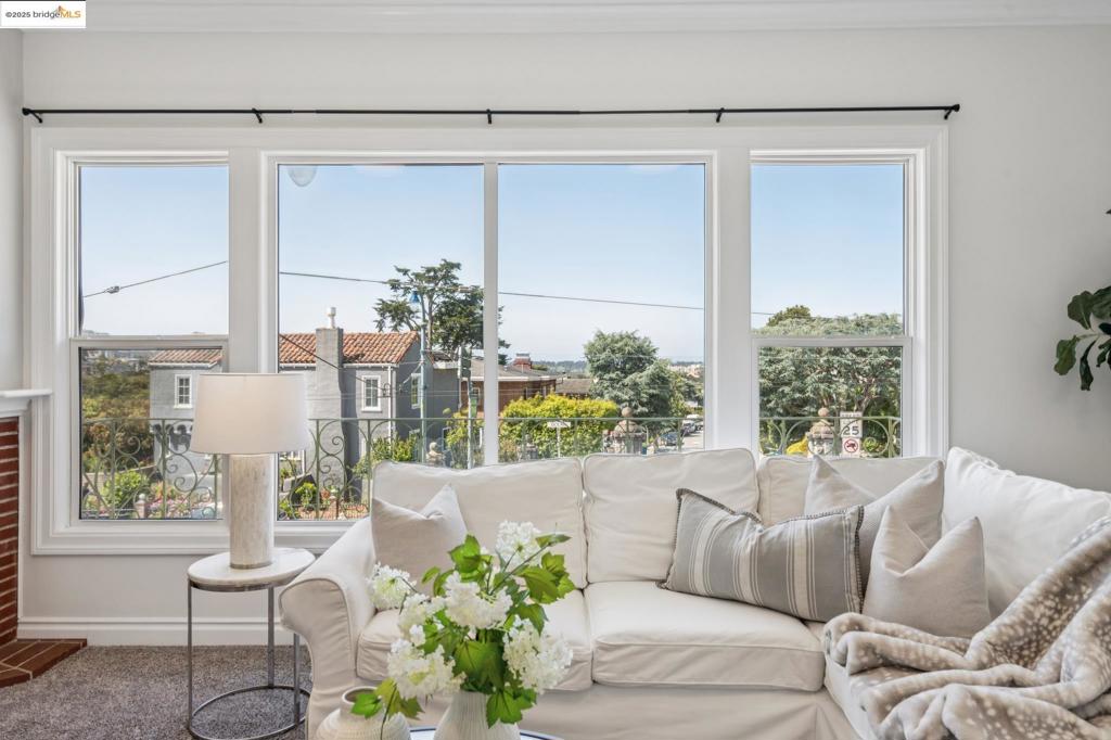 Discover this beautifully maintained two-story home located on a desirable corner lot in San Francisco’s scenic Mount Davidson neighborhood. This spacious 4-bedroom, 5-bathroom (plus 2 bonus rooms) residence blends timeless charm with modern updates, offering style and convenience in one of the city’s most tranquil enclaves. Step inside to find a bright and airy living room featuring a large picture window that fills the space with natural light and frames serene neighborhood views. The heart of the home is a recently updated kitchen, perfect for home chefs and entertaining alike. Two of the five bathrooms have been newly remodeled with contemporary finishes, and the entire home has been refreshed with a crisp coat of paint. Upstairs skylights invite in additional sunlight, while 100% owned solar panels offer energy efficiency and long-term cost savings. Outside, enjoy a private back patio for barbecues or peaceful evening retreats. Located within walking distance to Stonestown Galleria, restaurants, schools, and with easy access to public transportation. Whether you're looking for your forever home or a valuable addition to your real estate portfolio, this property presents a rare investment opportunity in one of San Francisco's charming neighborhoods.