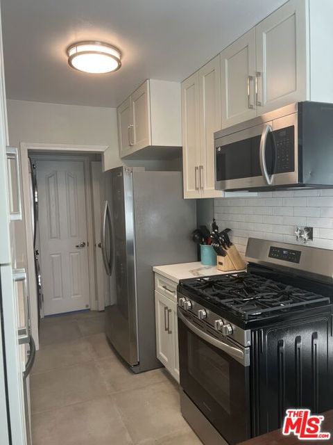 Photo of 2123 S Orange Dr Dr #4, Los Angeles, CA 90016 (MLS # 25603939)