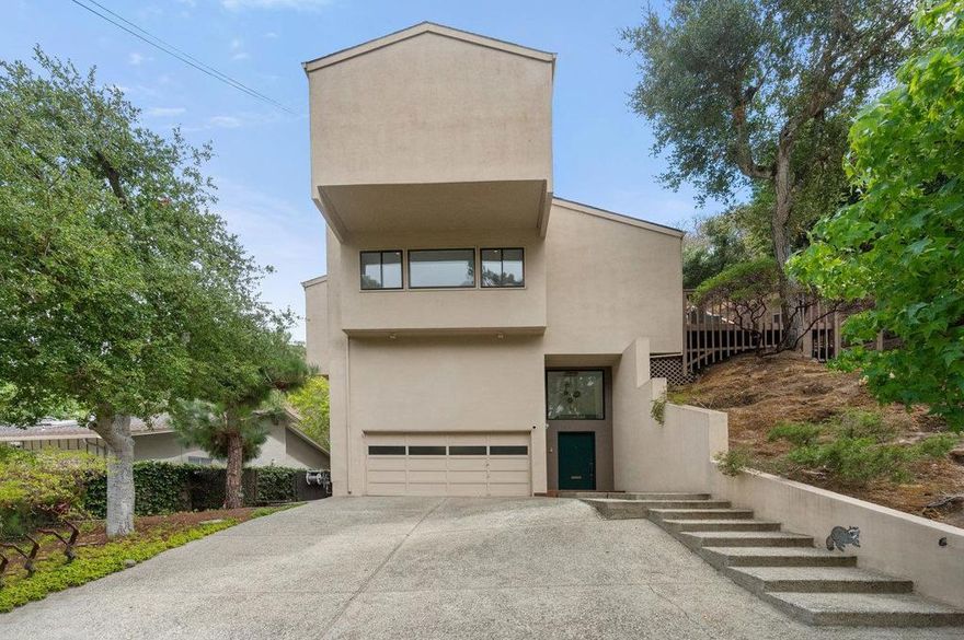 Designed and constructed by the acclaimed design team of Fred Herring (Architect) and Ray Worley (Engineer), 901 Laurelwood Drive is that rare opportunity to own a truly unique contemporary home nestled on the edge of acres of spectacular open space. Situated at the end of a highly romanticized and sought after street, the Laurelwood home has been thoughtfully refreshed, upgraded and is beautifully presented.  Boasting 3,180 square feet of living space (per county records), a massive 32,557 square foot land parcel (per public records), mesmerizing views, multiple sun decks, unheard of storage space and an unfinished detached studio - this is truly one home you will not want to miss!  For those who might be "stairs averse", the interior elevator serves each level - making it a breeze to age gracefully in place. Private, serene and brilliantly located at the edge of a spectacular open space forest - unique does not adequately describe the Laurelwood home. Best yet, it is within minutes of hiking trails, Sugar Loaf Park, Hillsdale Mall, Laurelwood Shopping Center, multiple transportation options and so much more! If contemporary architecture, privacy, remarkable scenery, amazing wildlife and convenience are your vibe - we welcome your visit to 901 Laurelwood Drive...