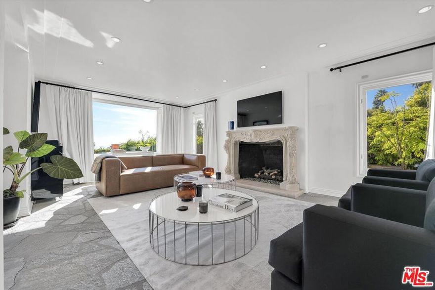 Incredible Compound plus a creative studio (not included in bedroom count) available now in Beverly Hills.... This stylish and fully gated private estate offers sweeping, head-on views of the city below -- an idyllic escape that feels worlds away, yet moments from it all. Evoking the charm of a European getaway, the home is available Furnished or Unfurnished to suit your lifestyle. A serene backyard with a stunning pool creates the perfect backdrop for effortless indoor-outdoor living. Inside, the main level features a spacious bedroom with en-suite bath, while two additional bedrooms upstairs each offer their own private bathrooms. A detached studio with its own bath currently staged as a guest suite offers versatile use as a creative workspace, gym, or home office. There is a second home included in this price, that is perfect for guests, as an office space, recording studio, etc. And to top it off, a converted garage that could be used as additional office, storage, or creative studio of your dreams! Roommates welcome -- Perfect for multi-generational families or creatives seeking a flex space, gym, ballroom, party room, filming/podcast/entertainment areas... Please inquire for details - -  Schedule your visit today ... you won't want to leave.