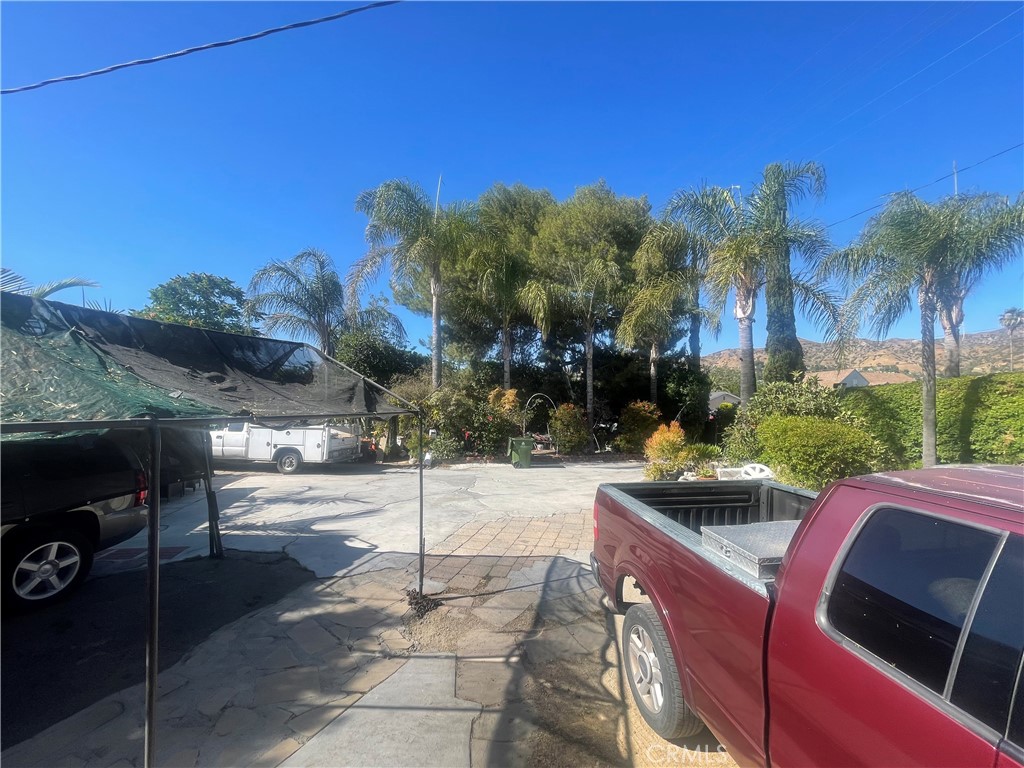 An exceptional investment opportunity hitting the market for the first time in over four decades! Nestled in a prime corner spot, this property encompasses both 7751 and 7759 Arvilla Ave., along with an additional APN 2405-002-03. With plenty of potential for development, these combined lots offer ample space for either expanding the existing structures or building brand-new residences. Each parcel comes with generous lot sizes: 7751 boasts 6,629 Sq.Ft. and 7759 boasts 7,435 Sq.Ft., totaling a spacious 14,064 Sq. Ft. The homes have slightly different square footages according to the assessor's records, with 7751 at 689 Sq.Ft. and 7759 at 712 Sq.Ft. Both properties feature 2 bedrooms and 1 bathroom, making for a total of four bedrooms and two bathrooms. Surrounded by lush gardens and verdant hedges, this property ensures privacy and tranquility for its occupants. Its strategic location, less than 1.3 miles from Burbank Airport and just 3 miles from the Burbank Empire Center, adds to its appeal.