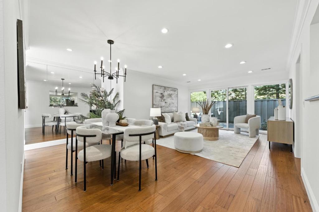 #1 at Los Altos Square is a beautifully updated single-story end-unit townhome nestled in the heart of this gated community, offering an elegant blend of comfort, style, privacy and convenience. Featuring two spacious en-suite bedrooms and a separate office, the home is filled with natural light from skylights and enhanced by gleaming hardwood floors. The kitchen includes recently updated appliances, and the layout flows seamlessly to three private patios perfect for outdoor living. Additional highlights include a detached two-car garage, forced air heating, and interior laundry. Enjoy access to community amenities such as three swimming pools, a sauna, and a clubhouse. Ideally located just steps from Whole Foods, Trader Joes, The Village at San Antonio, and Caltrain, with top-rated schools nearby including Almond Elementary, Egan Middle, and Los Altos High (buyer to verify). This home lives like a single-family residence and offers a sophisticated lifestyle in one of Los Altos most convenient and desirable locations.
