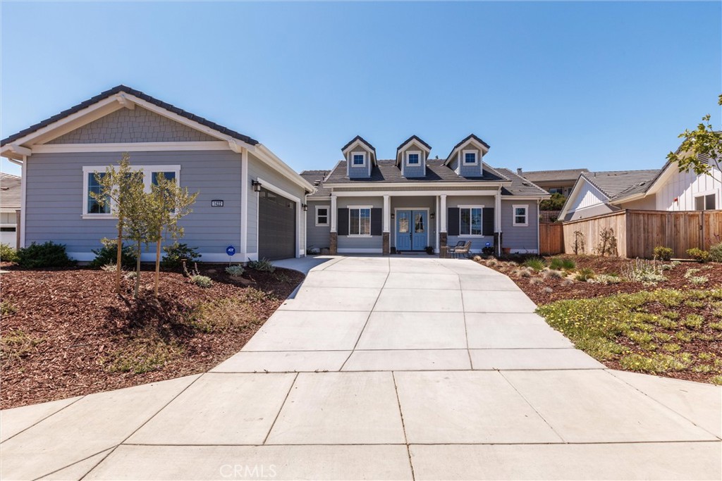 Stunning and nearly new, this beautifully upgraded 1-year-old single story home offers the perfect blend of comfort, style, and functionality. The spacious open-concept layout features a seamless flow between the living and kitchen areas, ideal for both entertaining and everyday living. A large separate dining room provides a more formal space for hosting family and guests. With 4 bedrooms and 3.5 bathrooms, the home is thoughtfully designed to accommodate a variety of lifestyles. The private primary suite serves as a peaceful retreat, complete with a luxurious ensuite bathroom. High-end finishes are found throughout, including upgraded quartz countertops, luxury vinyl plank flooring in the main living areas and wet rooms, and plush carpeting in all bedrooms. Over $40K in landscaping—ideal for family fun and entertaining! The large backyard is fully fenced with raised planters and fruit trees, and two patios offering space to relax or gather. Additional features include owned solar panels, soft water system, pre-plumbing for air conditioning and reverse osmosis system. Located in Vintage Ranch, a newly developed enclave of homes on estate-sized lots. The community is surrounded by lush oak groves and adjacent to the well-known Rice Ranch area, residents enjoy direct access to 580 acres of scenic open space—ideal for outdoor recreation and peaceful living.