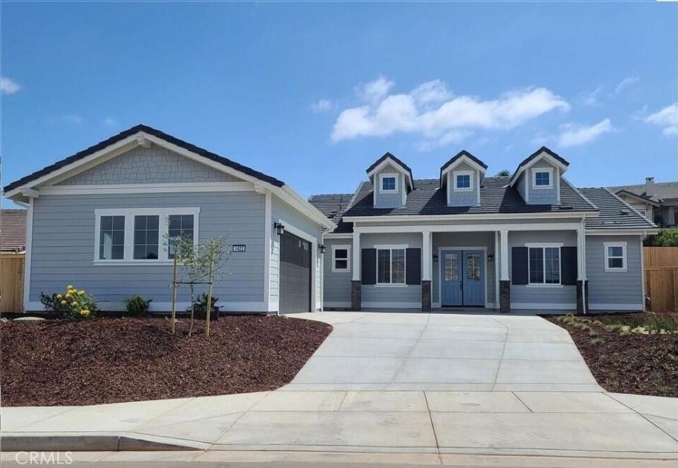 STUNNING AND NEARLY NEW, THIS BEAUTIFULLY UPGRADED 1-YEAR-OLD SINGLE STORY HOME IS MOVE-IN READY! Located in Orcutt, by Rice Ranch, this spacious open concept home features a seamless flow between the living and kitchen areas, ideal for both entertaining and everyday living. A large separate dining room provides a more formal space for hosting family and guests. With 4 bedrooms and 3.5 bathrooms, the home is thoughtfully designed to accommodate a variety of lifestyles. The private primary suite serves as a peaceful retreat, complete with a luxurious ensuite bathroom. High-end finishes are found throughout, including upgraded quartz countertops, luxury vinyl plank flooring in the main living areas and wet rooms, and plush carpeting in all bedrooms. Over $40K in landscaping—ideal for family fun and entertaining! The large backyard is fully fenced with raised planters and fruit trees, and two patios offering space to relax or gather. Additional features include owned solar panels, soft water system and reverse osmosis system. Located in Vintage Ranch, a newly developed enclave of homes on estate-sized lots. The community is surrounded by lush oak groves and adjacent to the well-known Rice Ranch area, residents enjoy direct access to 580 acres of scenic open space—ideal for outdoor recreation and peaceful living.